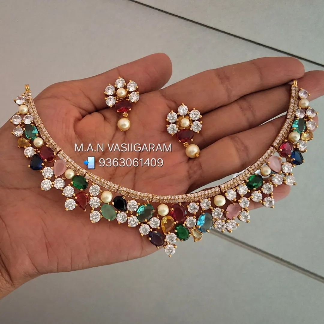 Multicolor neck set with earrings at M.A.N VASIIGARAM